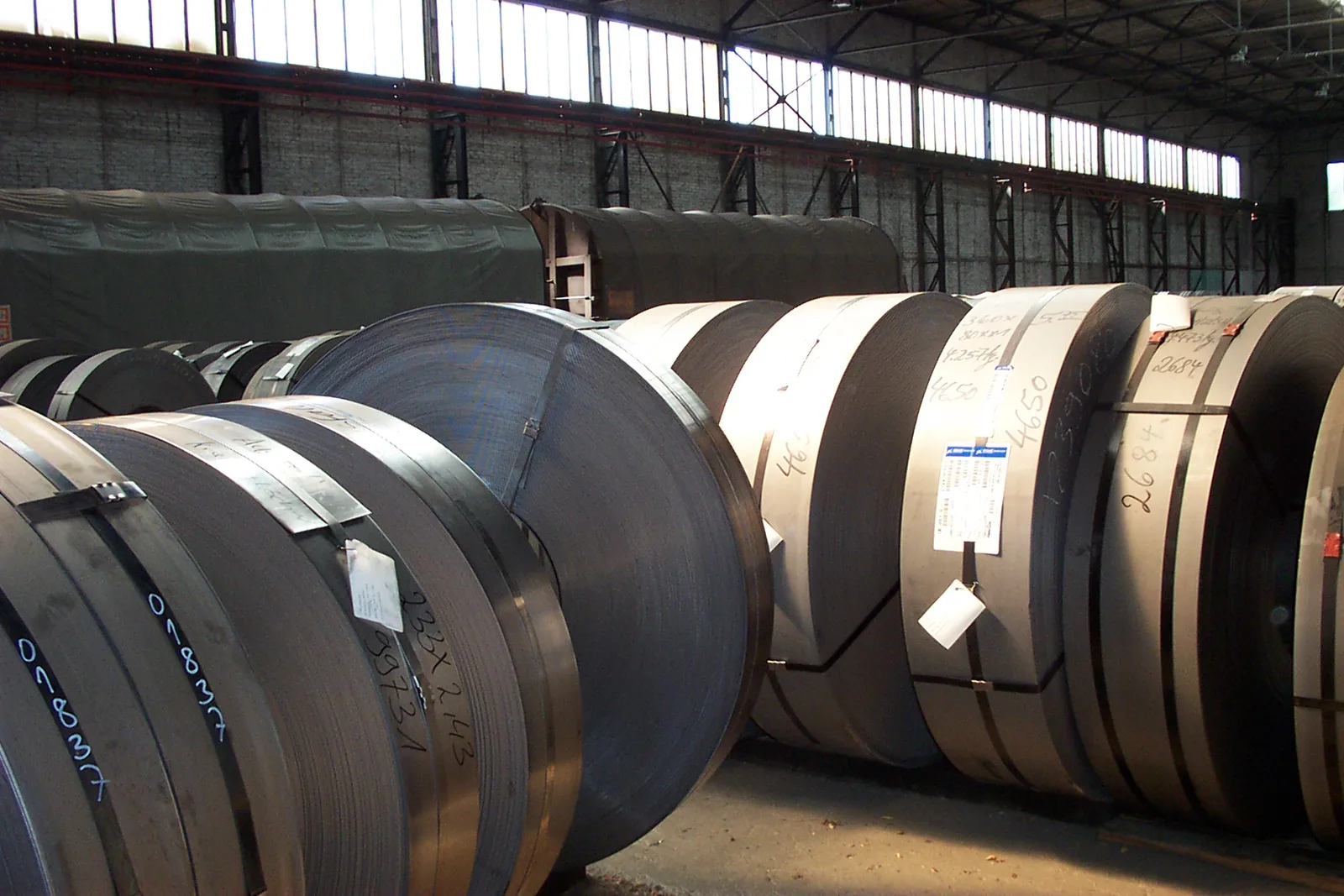 Steel coils in an industrial warehouse