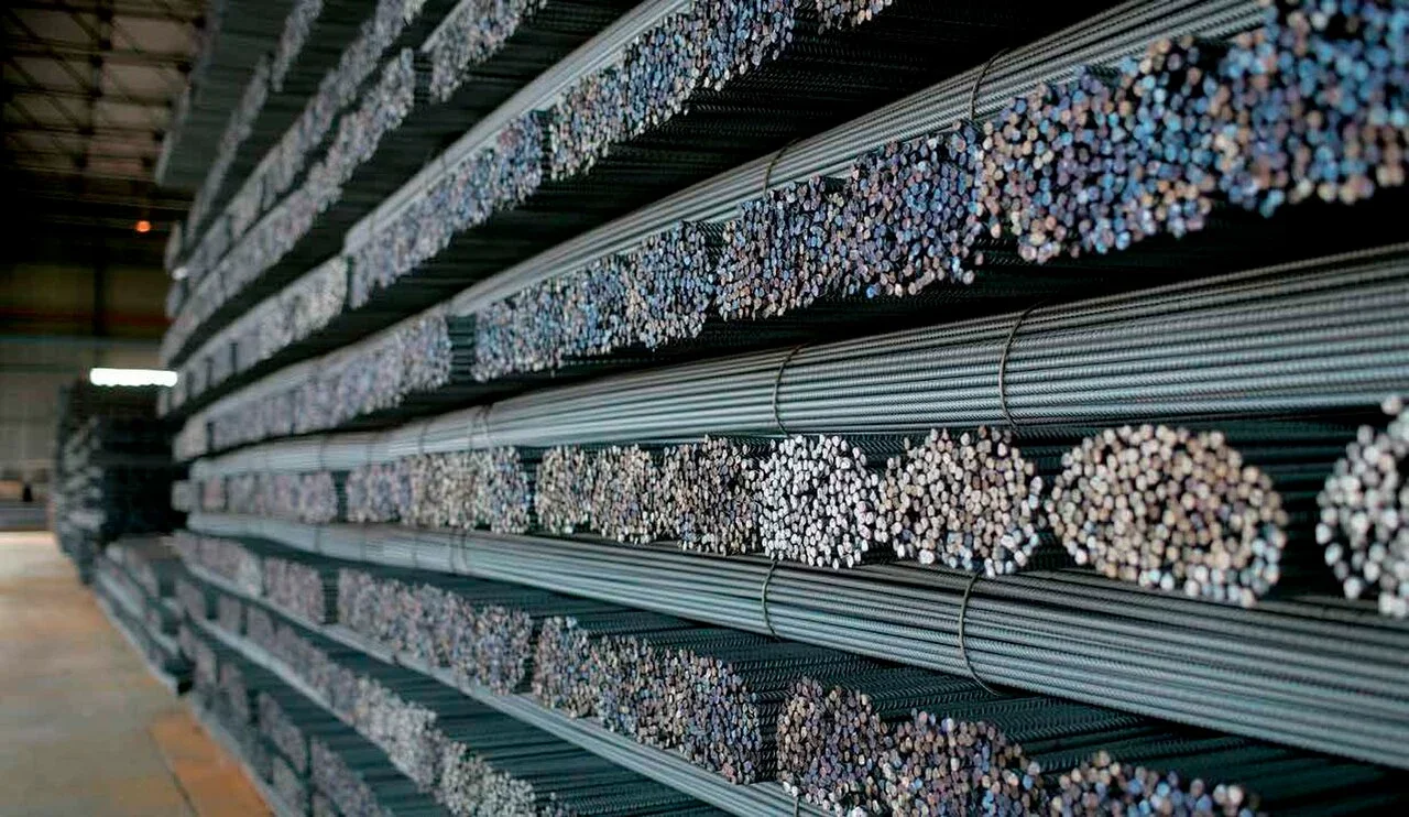 Large bundles of reinforcing steel stacked in a warehouse